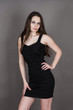 beautiful brunette in a black dress
