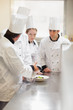 Head chef explaining something to class