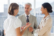 Group of business people discussing together