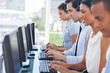 Call centre employees working on computers