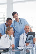 Medical team examining radiography