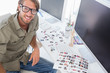 Photo editor at his desk