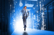 Businessman running through data center
