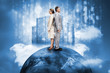 Business people on top of the world with data server