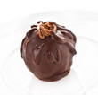 delicious liqueur dark chocolate candy on a white background, ma