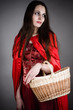 beautiful woman in the image of Little Red Riding Hood