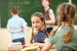 School children in classroom at lesson