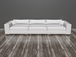 Grosse Couch vor grauer Wand