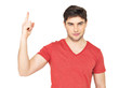 Photo: Young serious man with good idea sign Young serious man with good idea sign