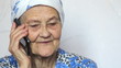portrait of old woman talking on smartphone