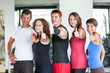 Group of People at Gym with Thumbs Up
