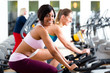 People Spinning in the gym on bicycles