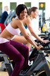 People Spinning in the gym on bicycles