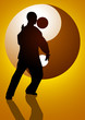 A man figure doing taichi with Yin Yang symbol as the background