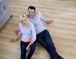 Foto: Upper view of couple relaxing on the floor Upper view of couple relaxing on the floor