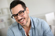 Foto: Cheerful handsome trendy guy with glasses Cheerful handsome trendy guy with glasses