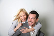 Cheerful trendy couple having fun