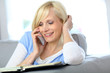 Woman on the phone checking agenda