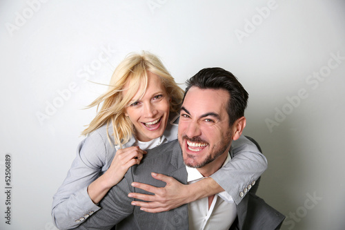 Photo: Cheerful trendy couple having fun Cheerful trendy couple having fun