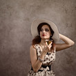 woman in hat with martini