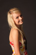 Beautiful blonde girl posing in studio
