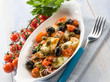 Photo: squid with tomatoes olives and capers squid with tomatoes olives and capers