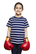 Young girl wearing boxing gloves smiling