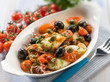 Photo: squid with tomatoes olives and capers, selective focus squid with tomatoes olives and capers, selective focus
