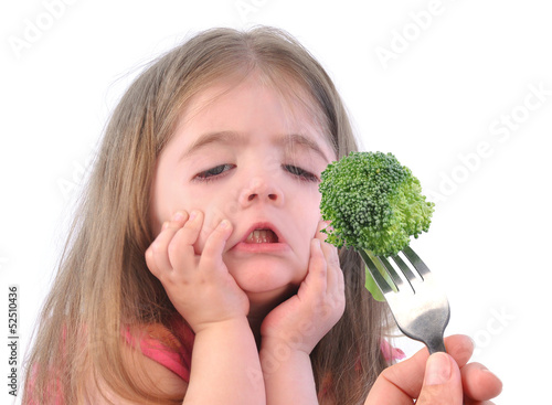 Photo: Girl and Healthy Broccoli Diet on White Girl and Healthy Broccoli Diet on White