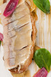 close-up snack from marinade herring with mustard sauce