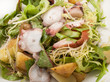 close-up salad from vegetables and octopus on plate