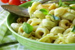 Italian tortellini with basil and olive oil
