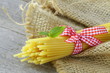 Photo: Italian still life - pasta on a wooden table Italian still life - pasta on a wooden table