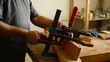 Luthier working on a mastil of flamenco guitar