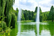 beautiful landscape with a lake with fountains and  park