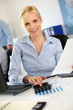 Businesswoman reading document at work