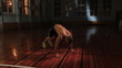 Young muscular athlete works out with jumps and push-ups
