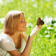 Photo: Woman playing with a butterfly Woman playing with a butterfly