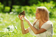 Photo: Woman playing with a butterfly Woman playing with a butterfly
