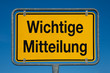 Foto: Ortsschild mit blauem Himmel WICHTIGE MITTEILUNG Ortsschild mit blauem Himmel WICHTIGE MITTEILUNG