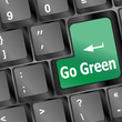 A keyboard with a key reading Go Green