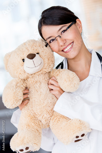 Photo: Friendly pediatrician smiling Friendly pediatrician smiling