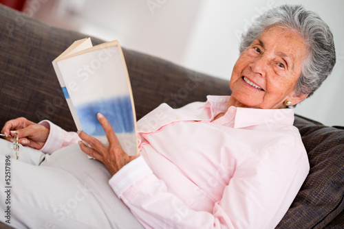Photo: Edler woman reading a book Edler woman reading a book