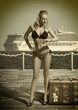 sexy woman tourist looking her watch in a vintage shot