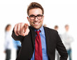Photo: Businessman pointing his finger at you Businessman pointing his finger at you