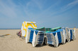 Stacked empty beds at the beach