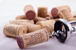 Bunch of corks and corkscrew