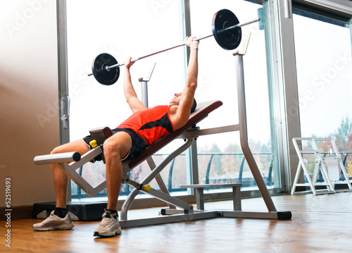 Photo: Man lifting a yoke Man lifting a yoke