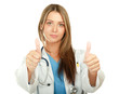 A female doctor showing ok, isolated on white background