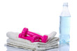 Bottle of  a water, dummbell, towel